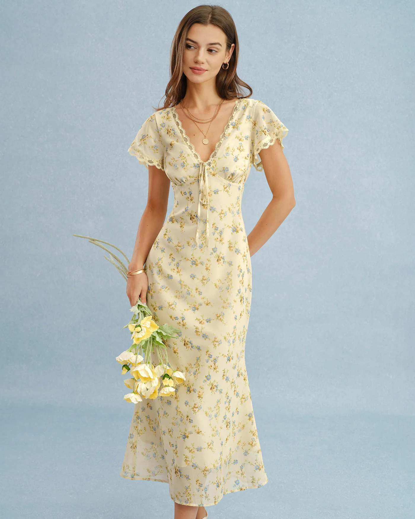 c73b422e6dbbbf93742fb8ebacf06622c71f91febf1a03bc9c80d26c5a6e4537.webp Yellow V Neck Lace Floral Maxi Dress - Image 1